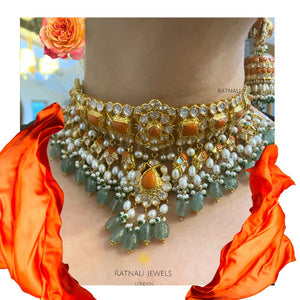 Moonga Set | Coral and Polki gemstone Necklace and Jhumka Earrings Set in gold-plated silver